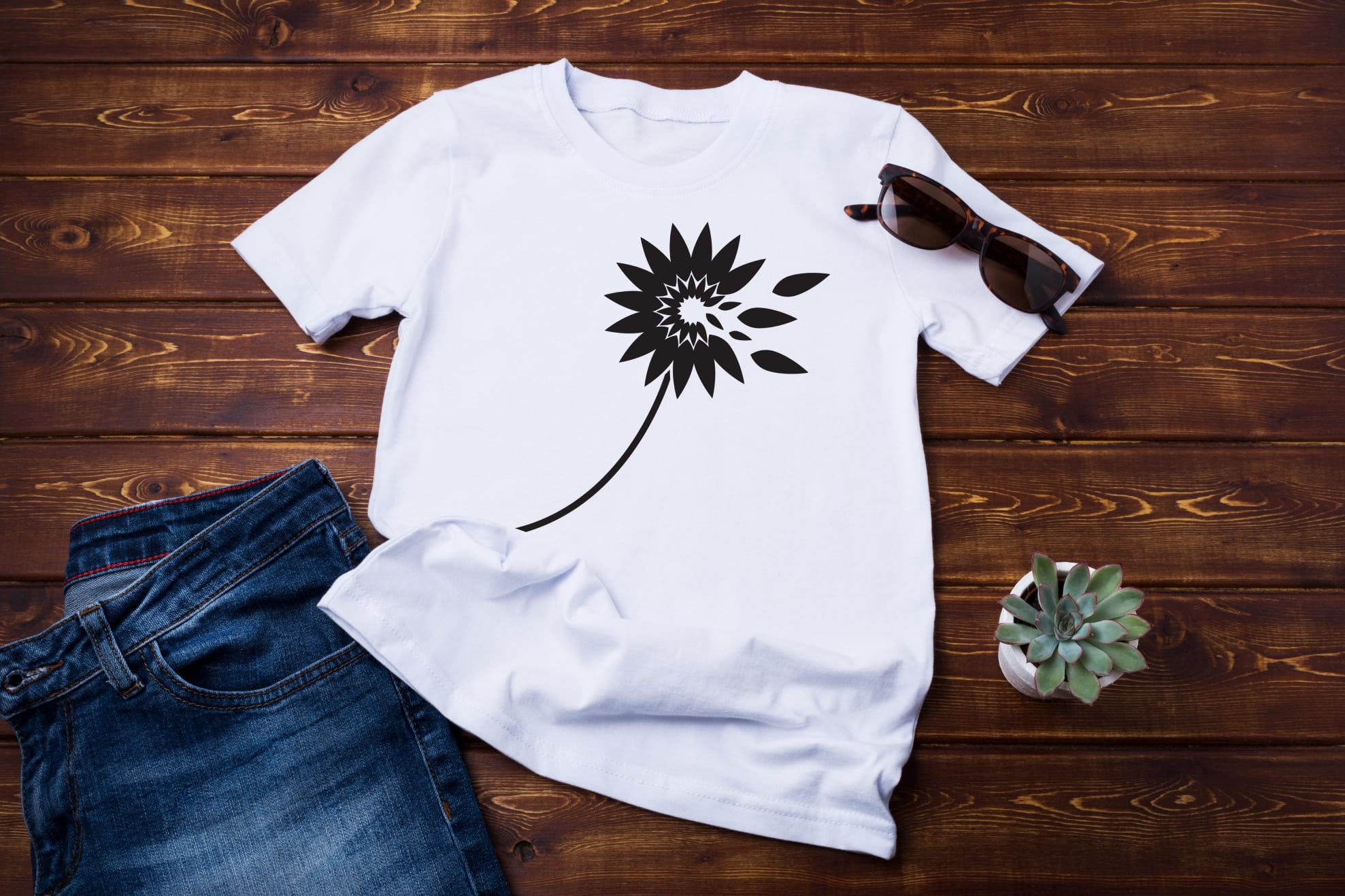 T-shirt image with amazing dandelion print in black color.