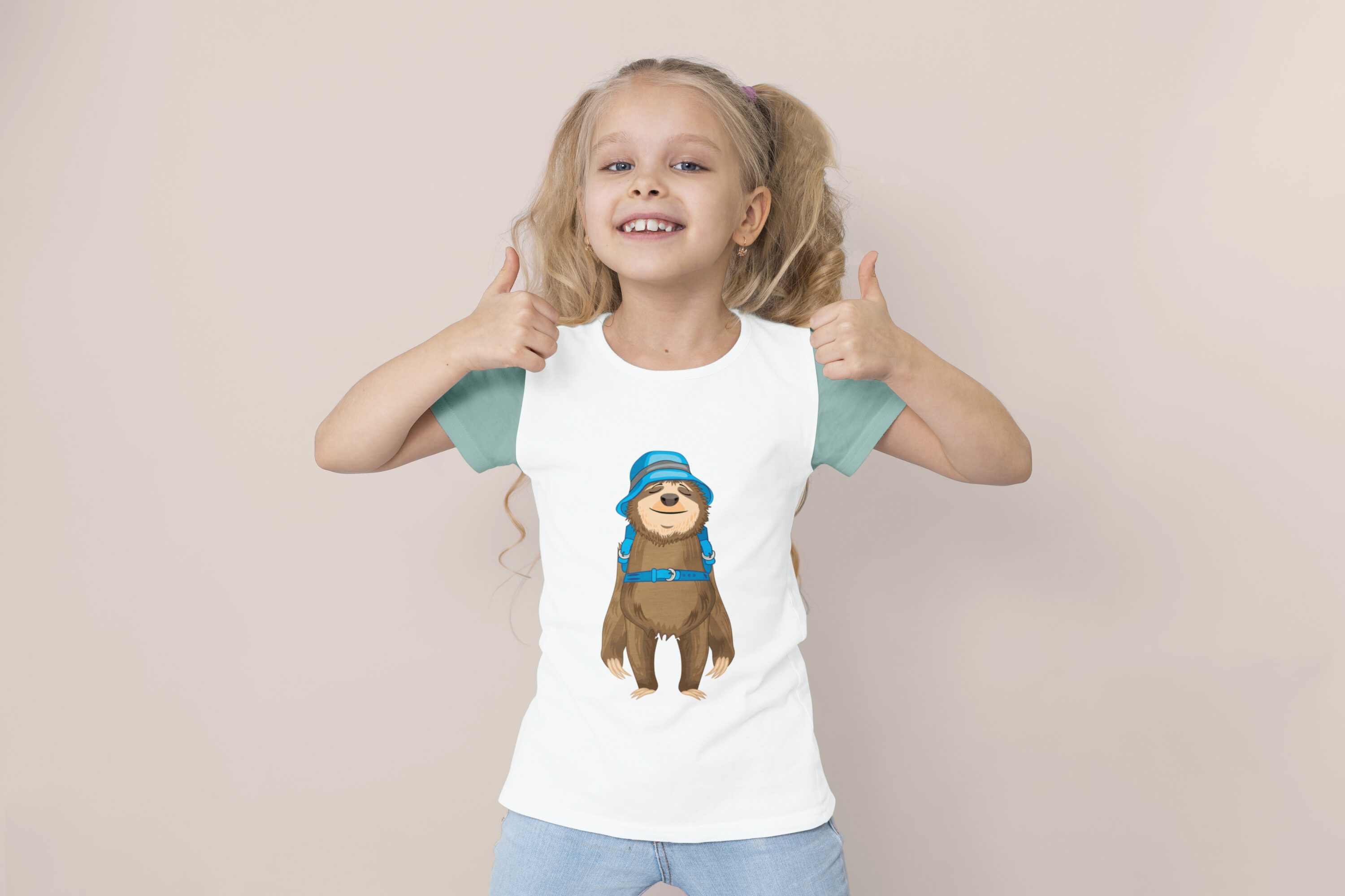 Image of a white t-shirt on a child with an adorable sloth print with a backpack.