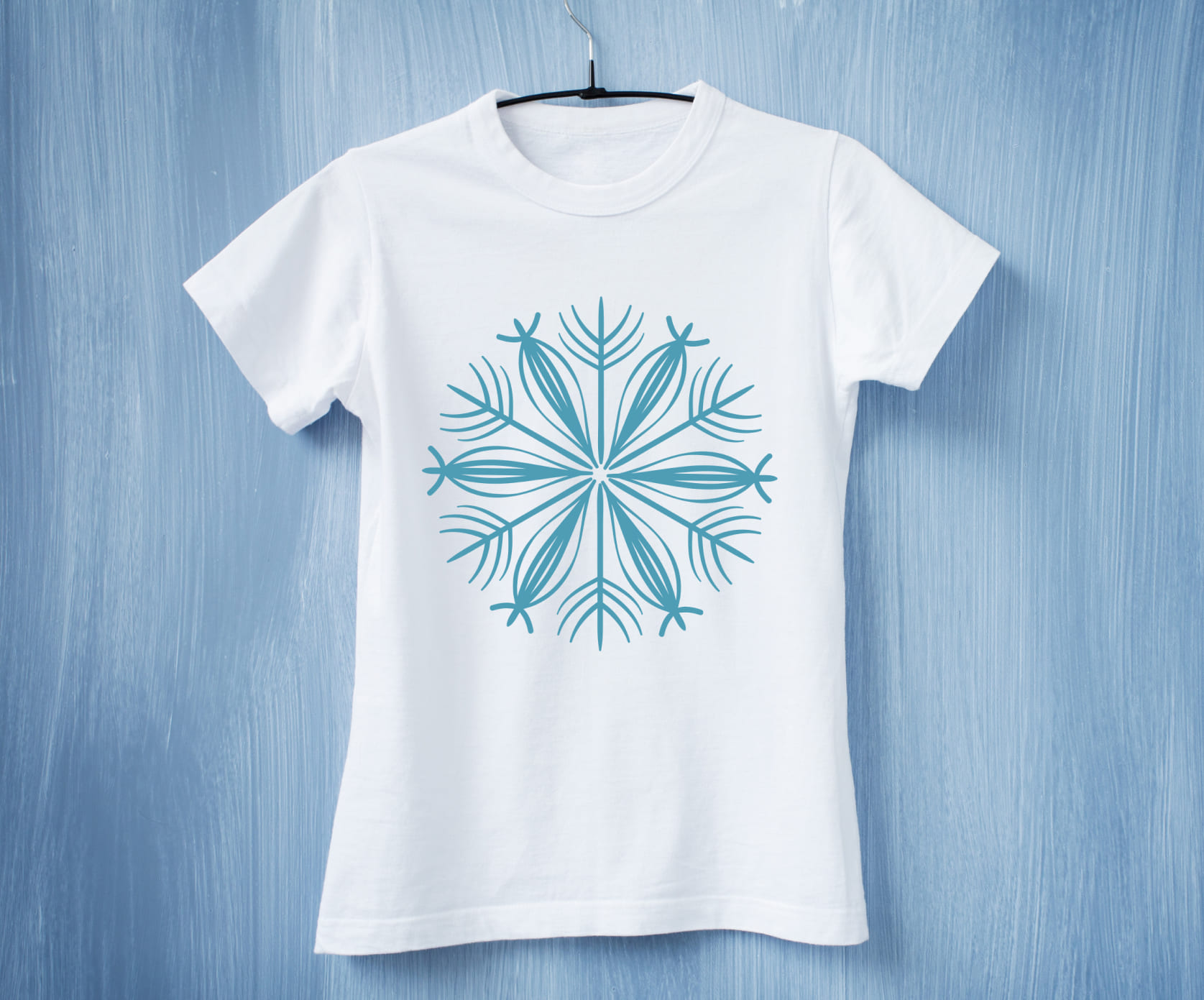 Flower snowflake ornament on the classic white t-shirt.