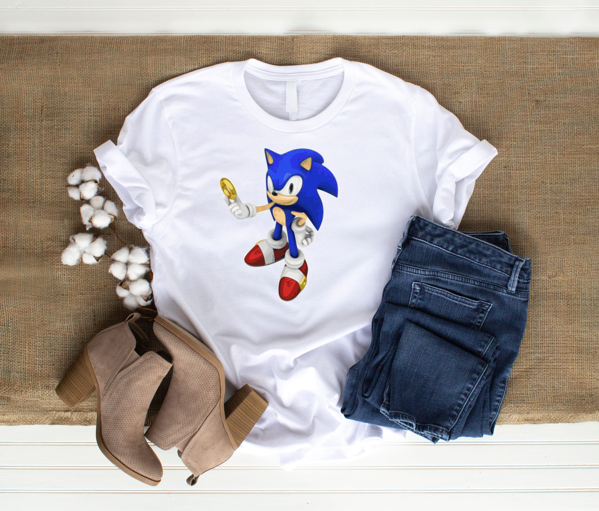 Blue bithday Sonic on the white t-shirt.