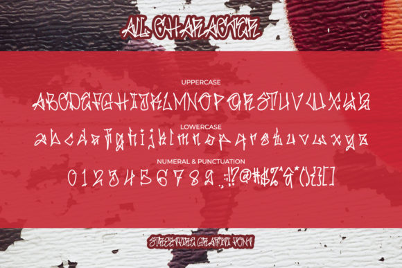 An example of white all uppercase and lowercase letters, numbers, and symbols in graffiti font on a red background.