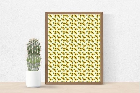 Cactus in a pot and picture in brown frame with sunflowers on a light yellow background.