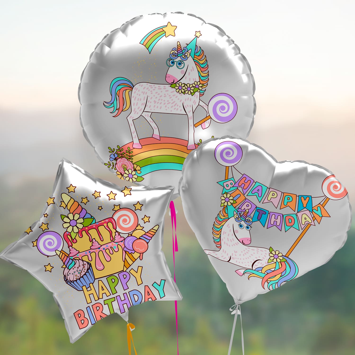 Silver balloons with rainbow unicorns for birthday party.