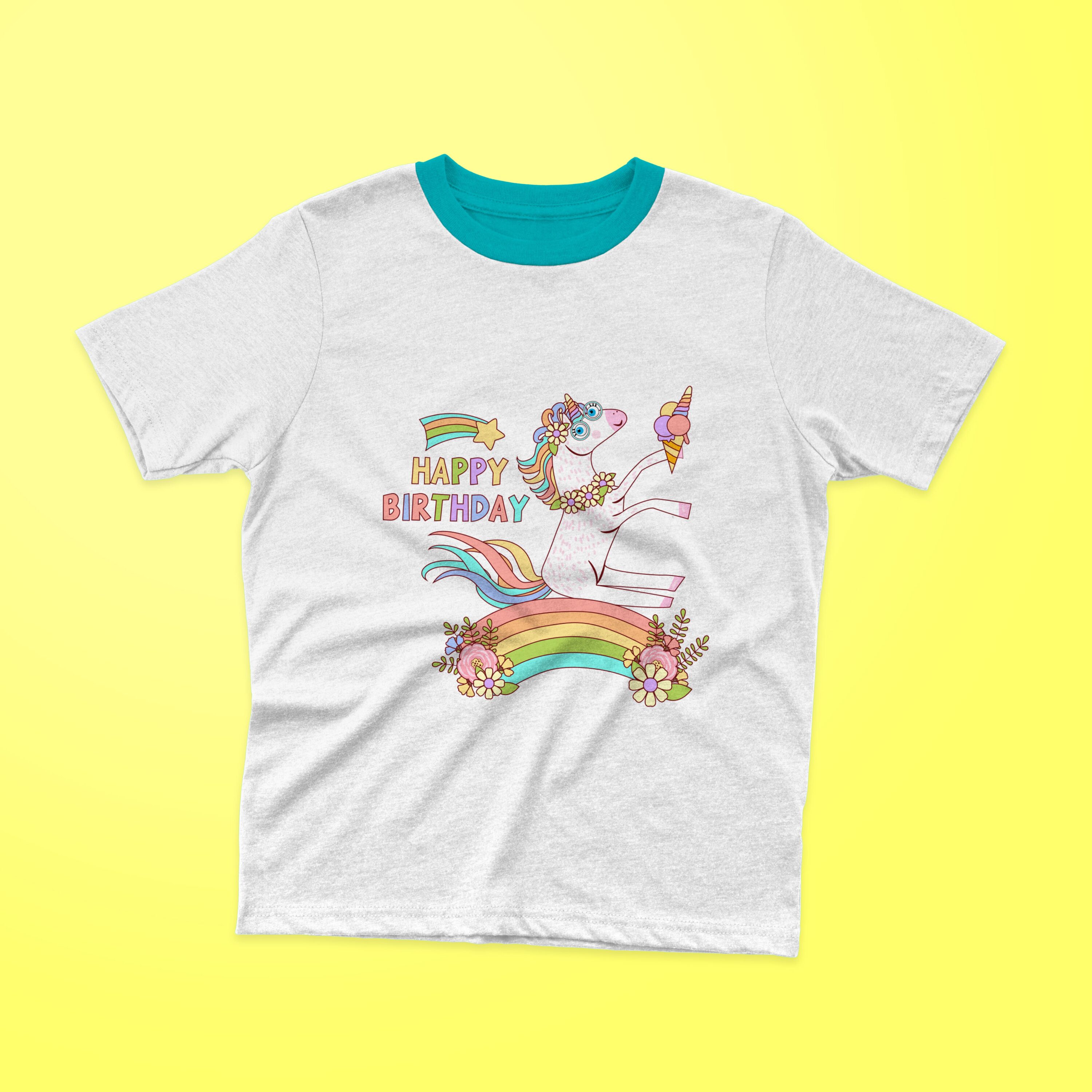 White t-shirt with a turquoise collar and a cute unicorn with colorful lettering "HAPPY BIRTHDAY" and a rainbow on a yellow background.