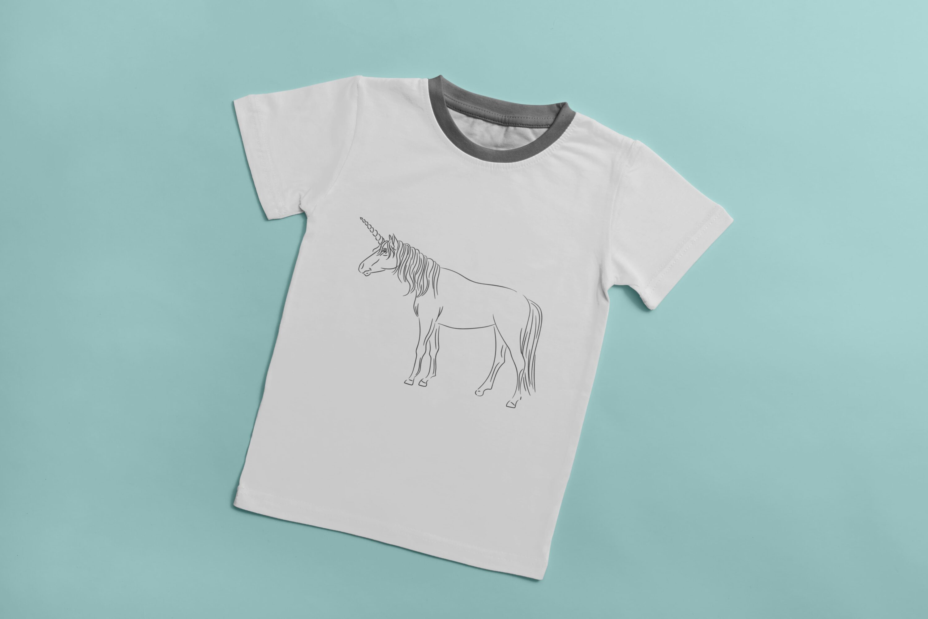 White t-shirt with a gray collar and a gray silhouette of a unicorn on a light blue background.