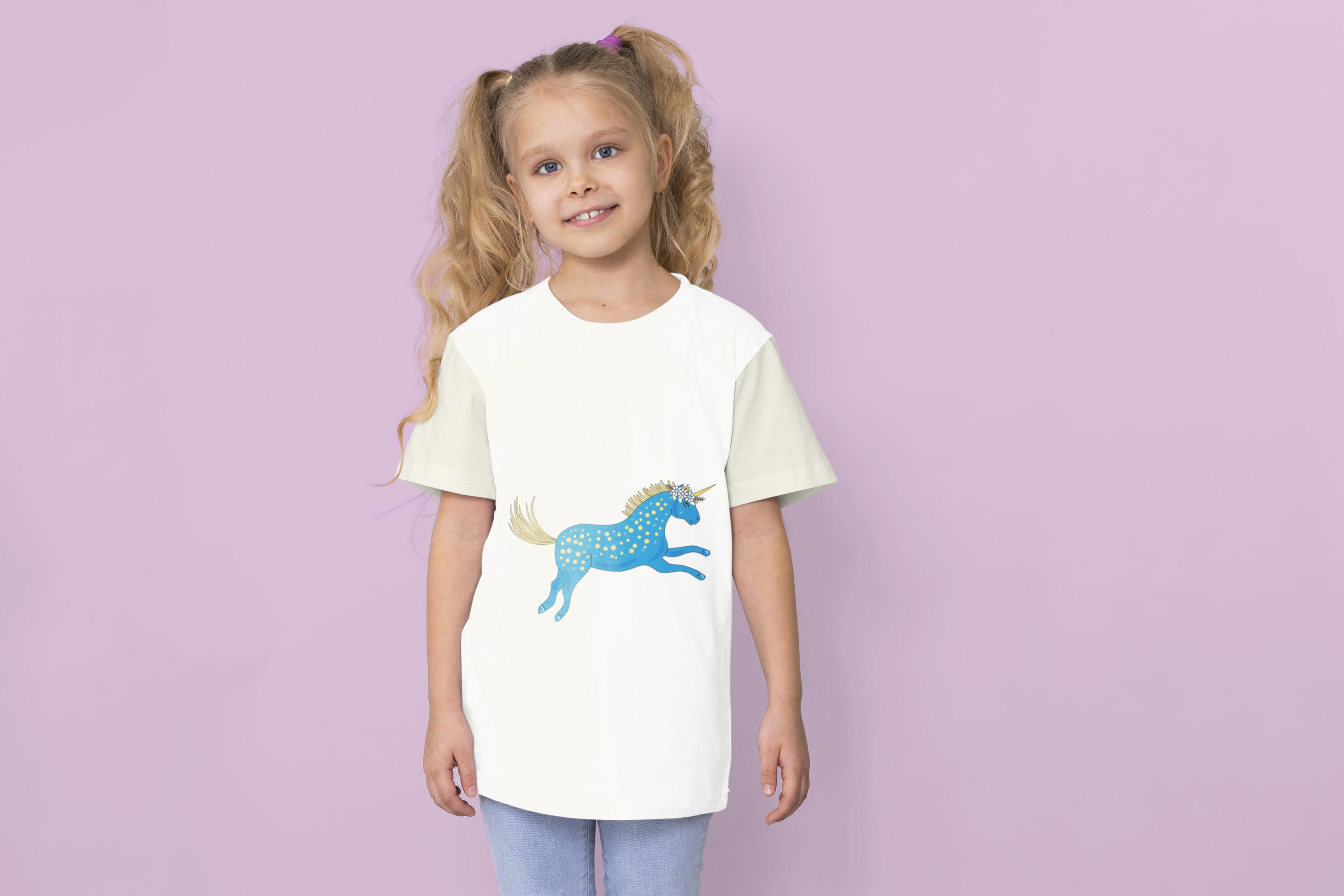 A white t-shirt with a blue unicorn on a girl on a lavender background.