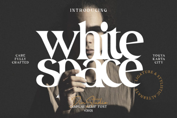 White lettering "White Space" on a black vintage background.
