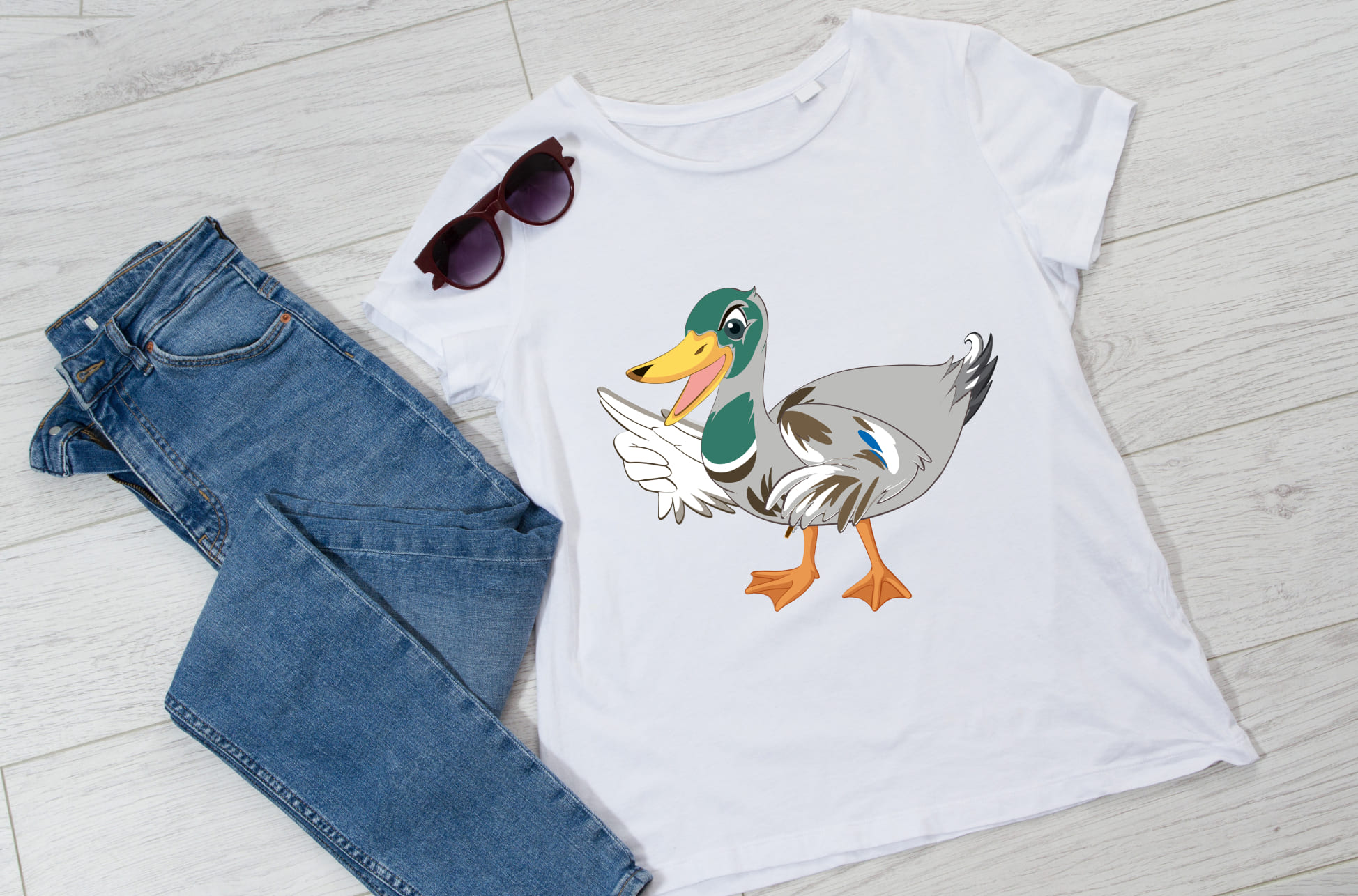 Picture of white t-shirt with adorable wood duck print.
