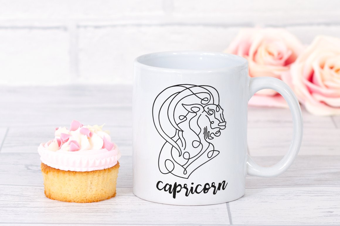 Big white cup with the Capricons graphic.