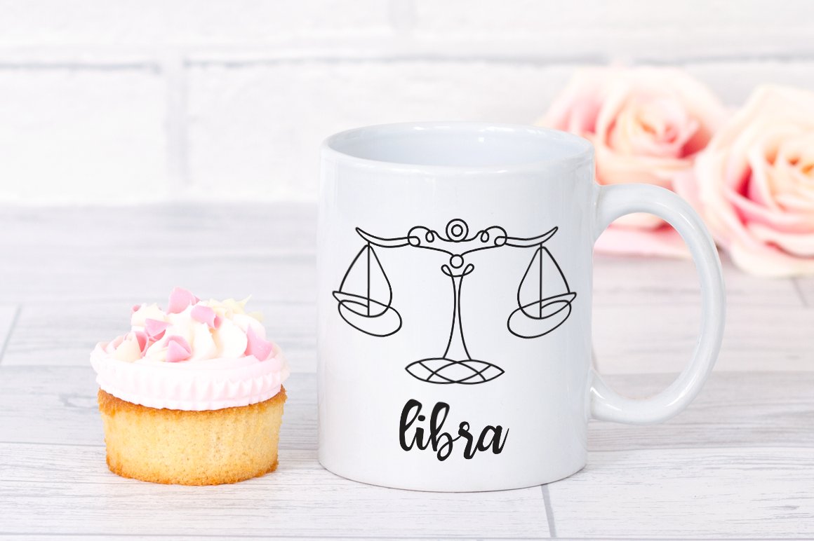 Big white cup with the Libra graphic.