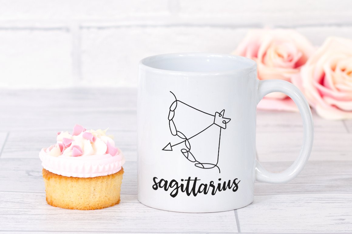 Big white cup with the sagittarius graphic.