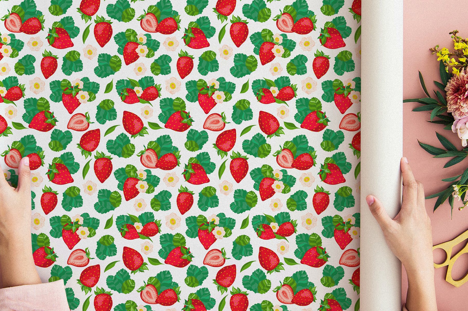 White wrapping paper with illustrations of strawberries with leaves.
