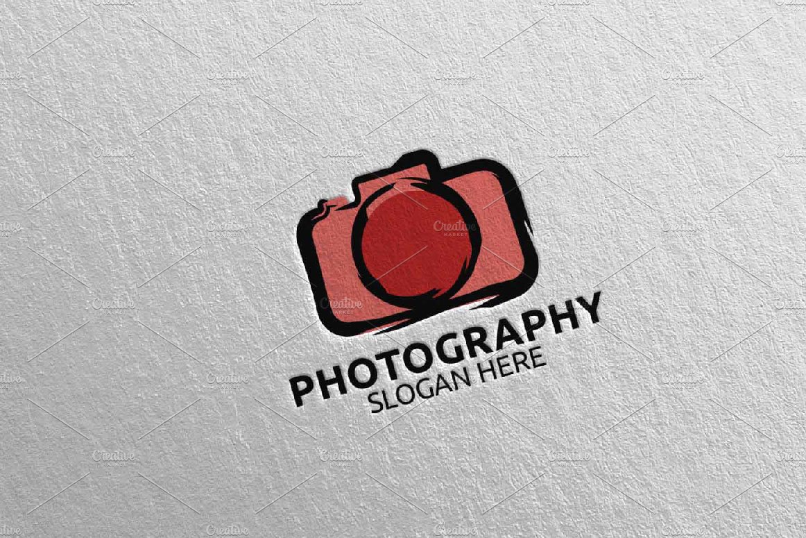 Light matte paper with a red camera logo.