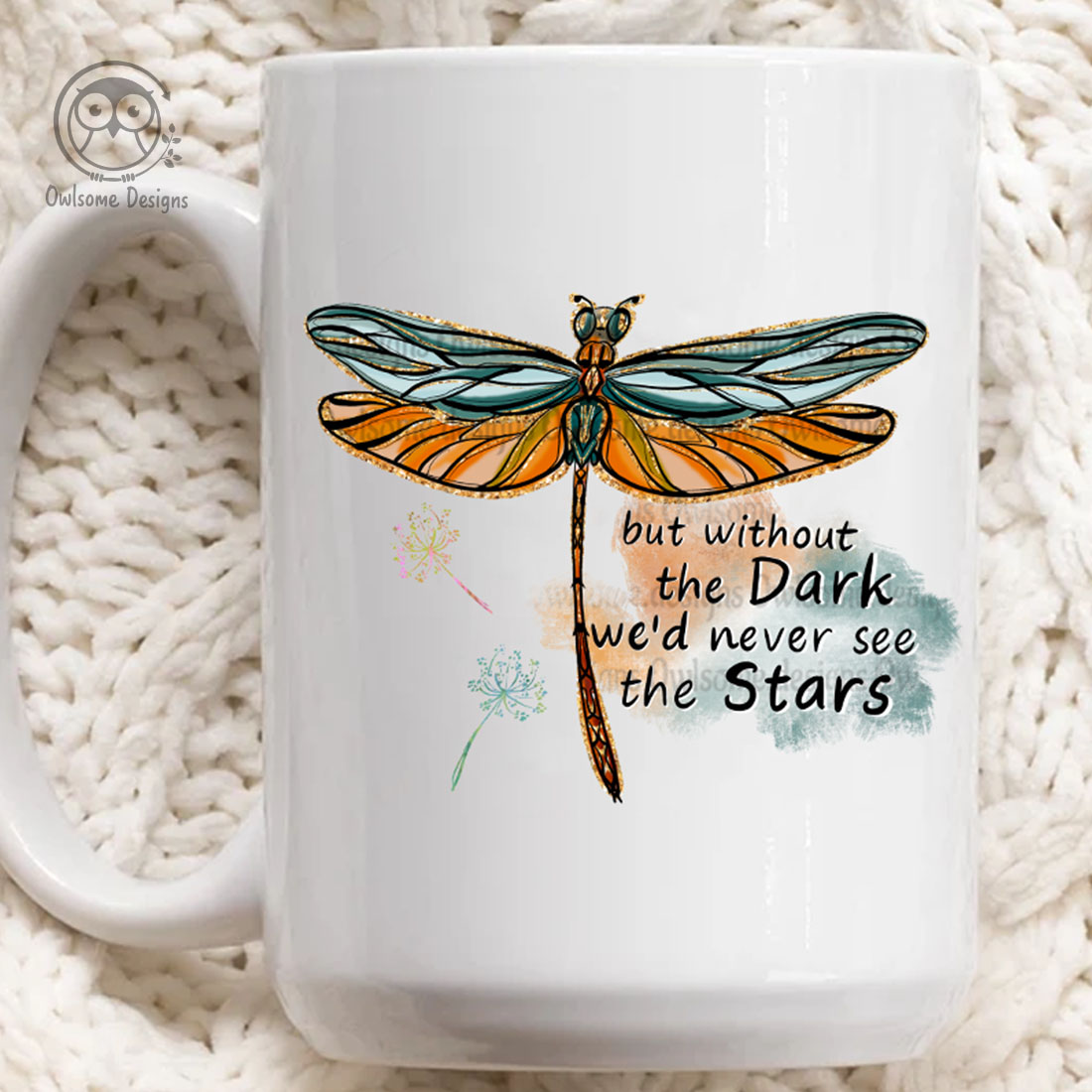 Image of cup with colorful dragonfly print and inscription.