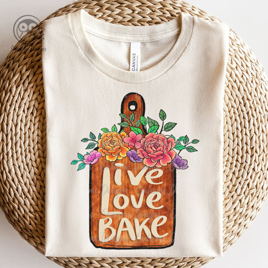 Image of a t-shirt with an enchanting cutting board print.