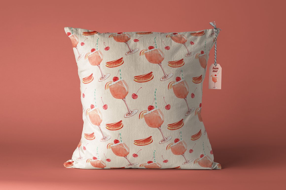 A white pillow with illustrations of drinks on a pink background.