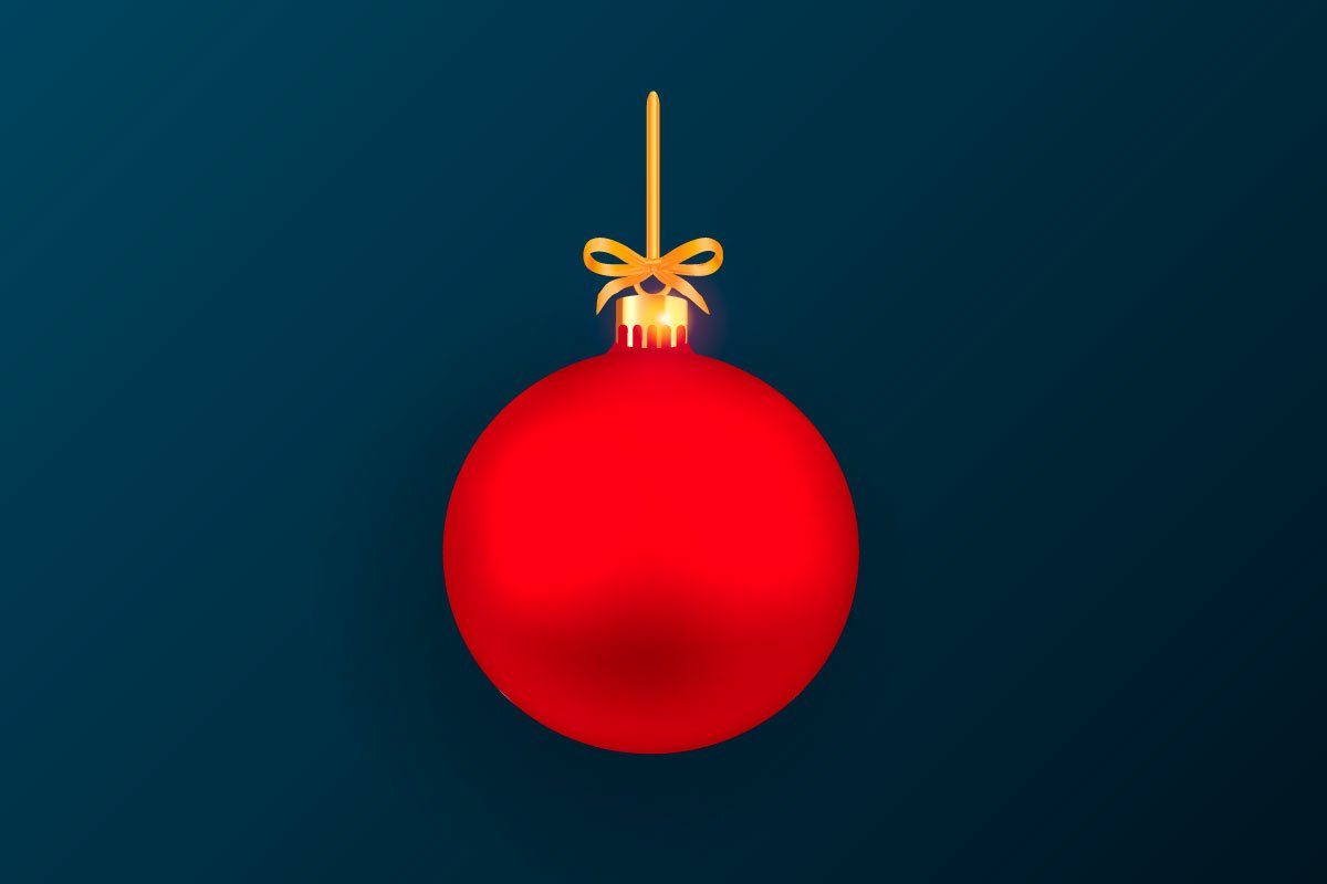 Deep green matte background with the red Christmas ball.