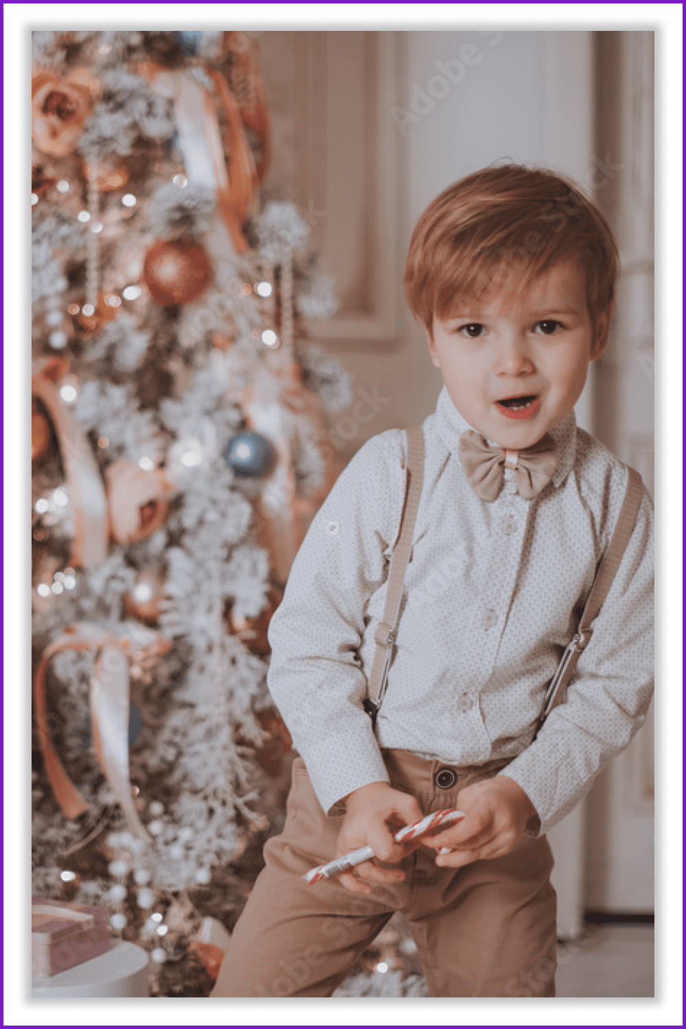 Little boy in classic clothes against the background of a stolen Christmas tree.