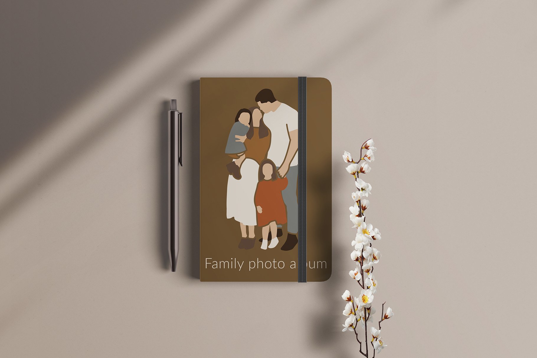Olive notebook with a family on a cover.