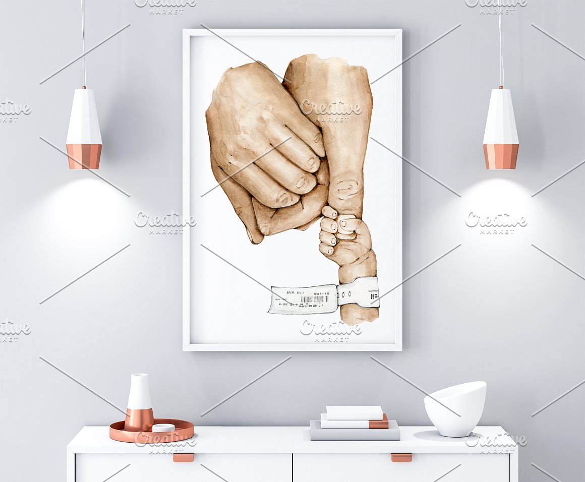 Picture with family preemie baby holding hands on a white background in white frame.