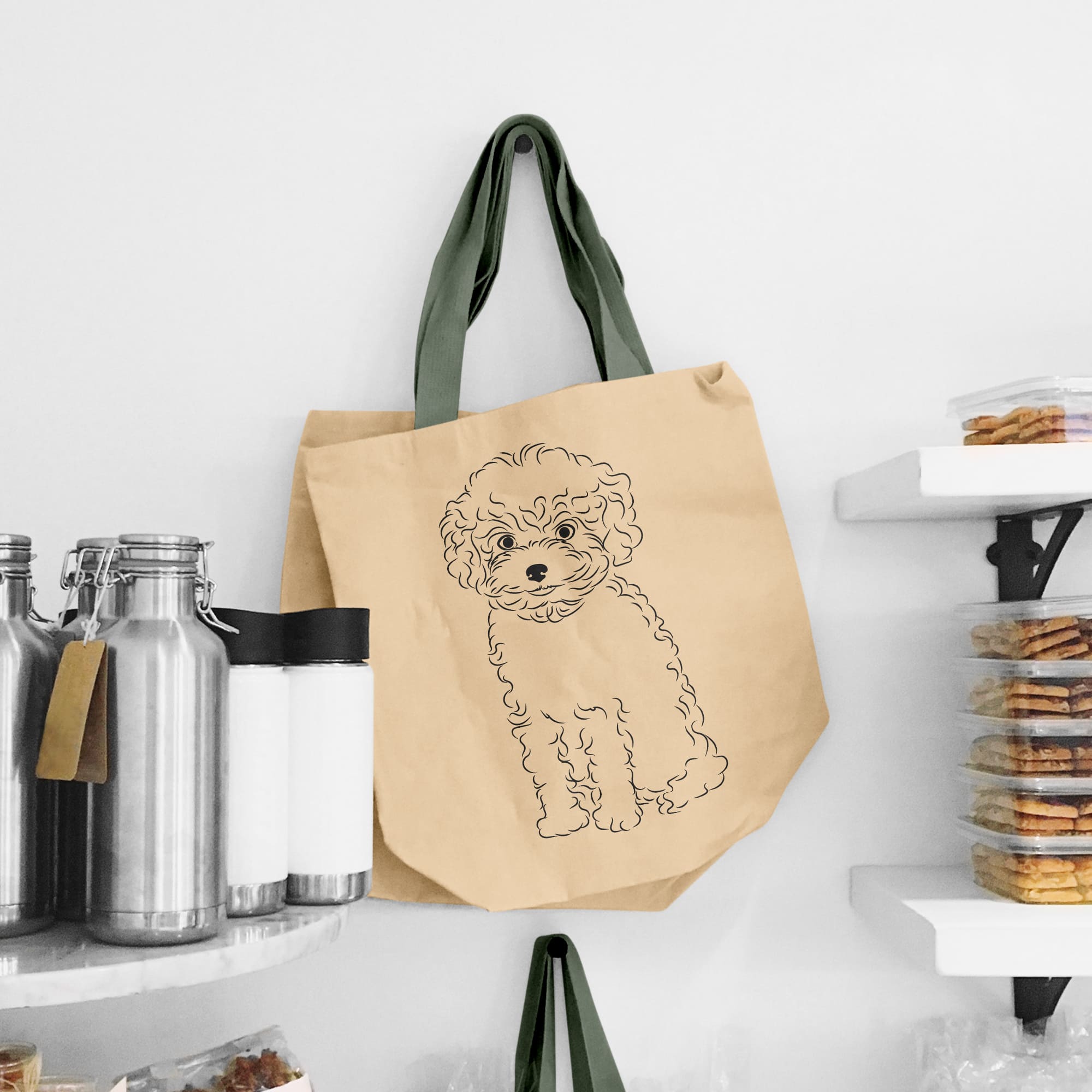 Bag with a dog drawn on it hanging on a wall.