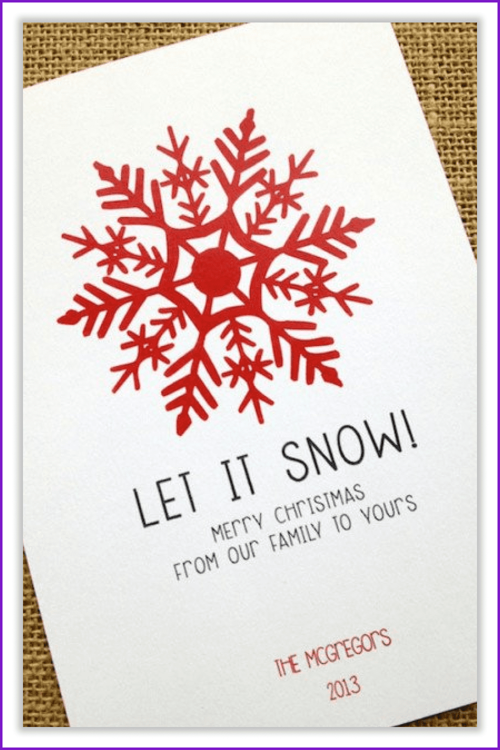 Christmas card with big red snowflake.