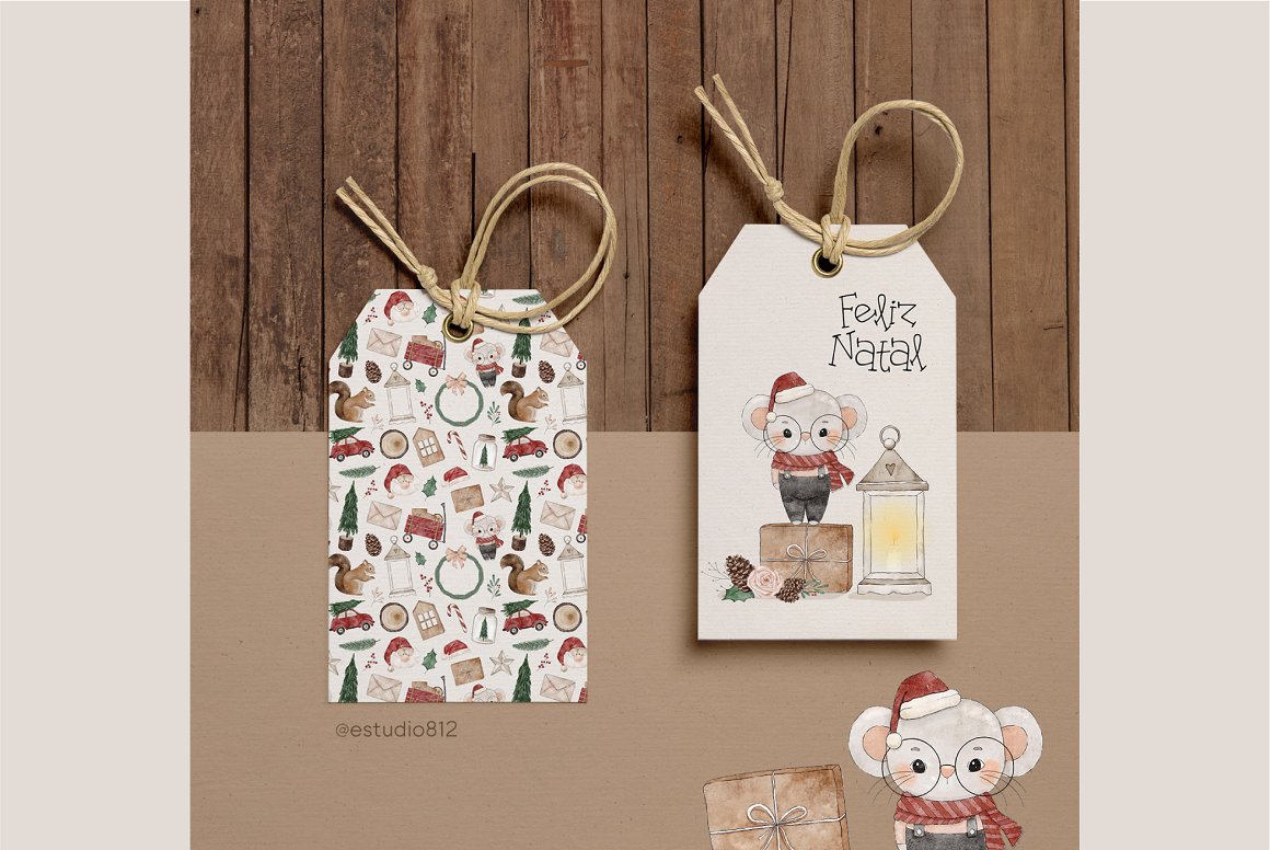 2 white labels with watercolor christmas illustrations on the wooden background.