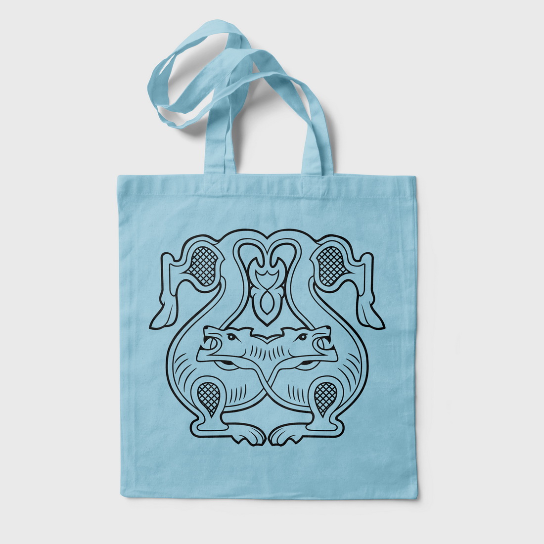 Blue tote bag with a picture of a fish.