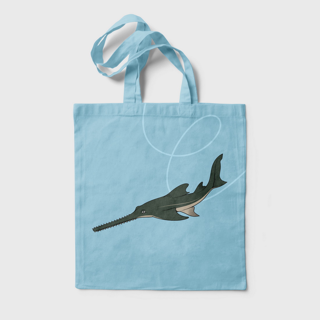 Image of bag with colorful shark print.