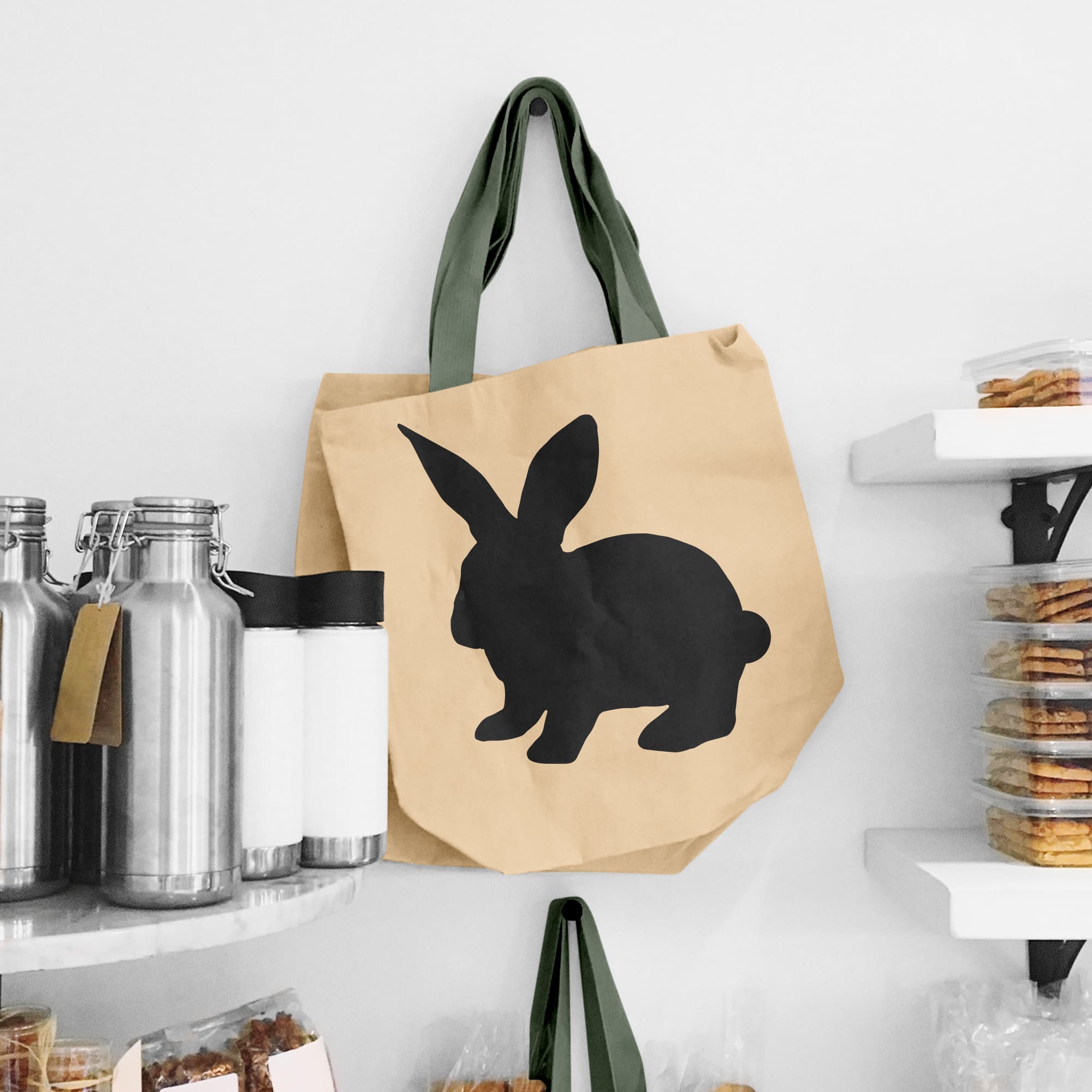 Brown bag with a black rabbit on it.