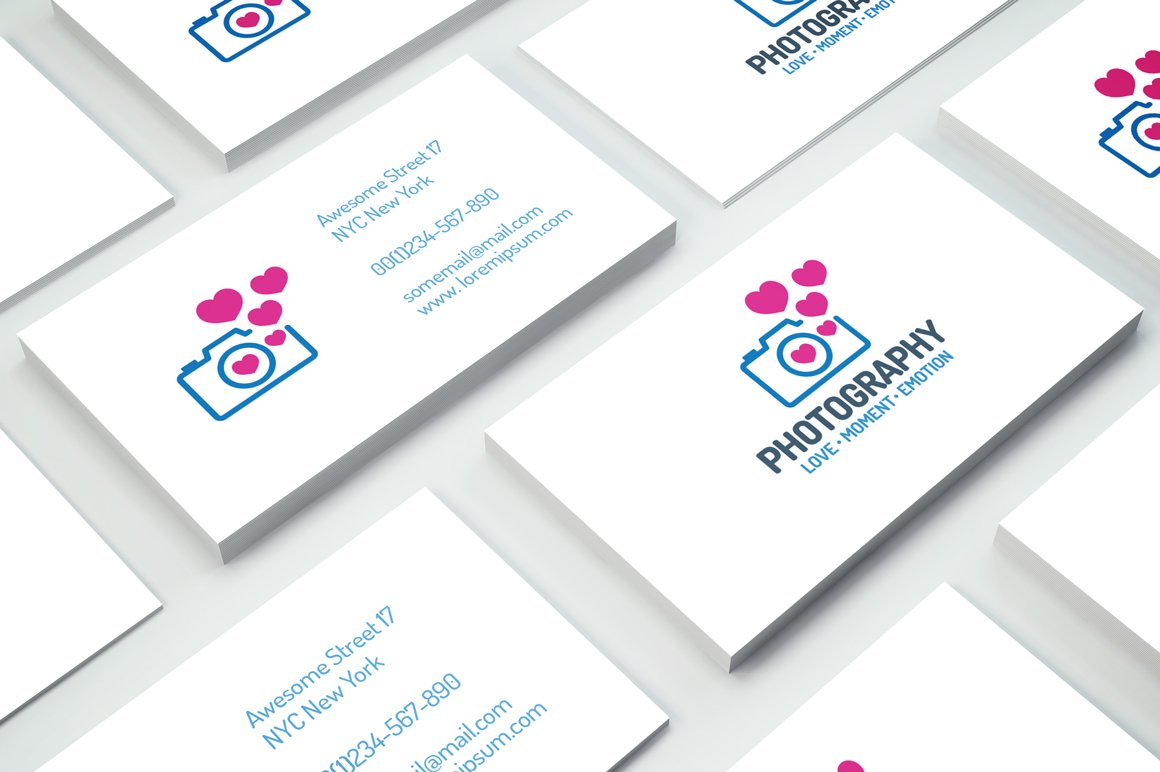 Some business cards with the camera hearts logo.