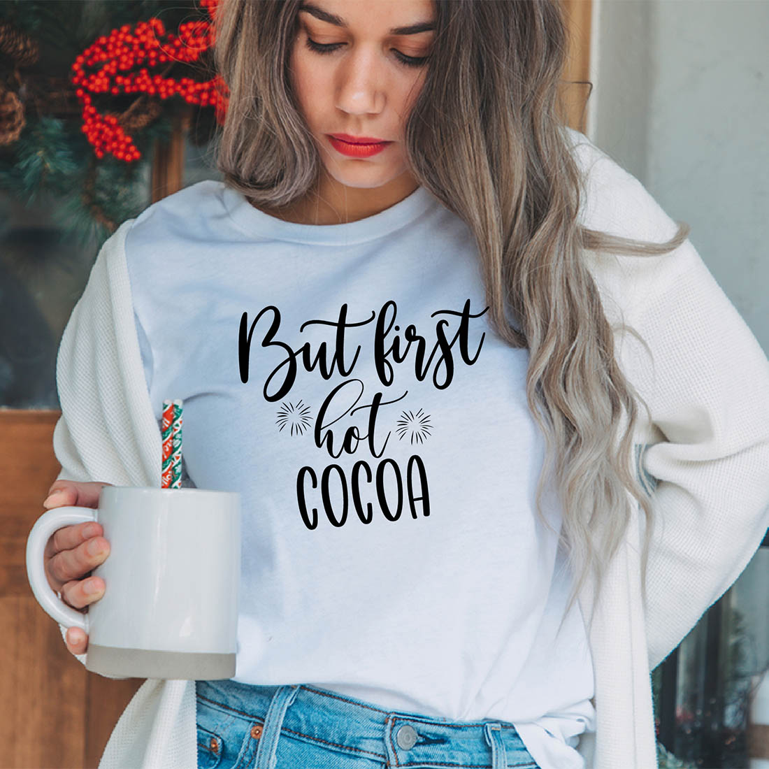 Image of a girl in a white t-shirt with a beautiful black inscription "but first hot cocoa".