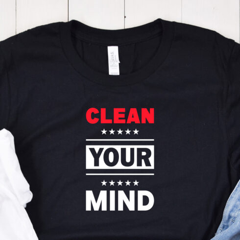 Image of a black t-shirt with a gorgeous "clear your mind" slogan in red and white colors.