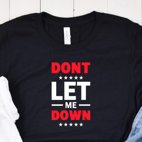 Image of a black t-shirt with the enchanting inscription "dont let me down" in red and white colors.