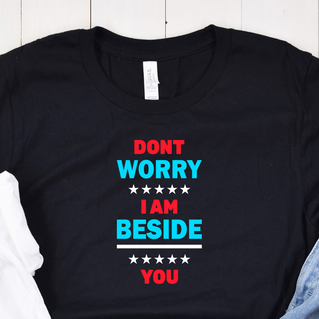 Image of black t-shirt with amazing "dont worry i am beside you" lettering in red and turquoise colors.