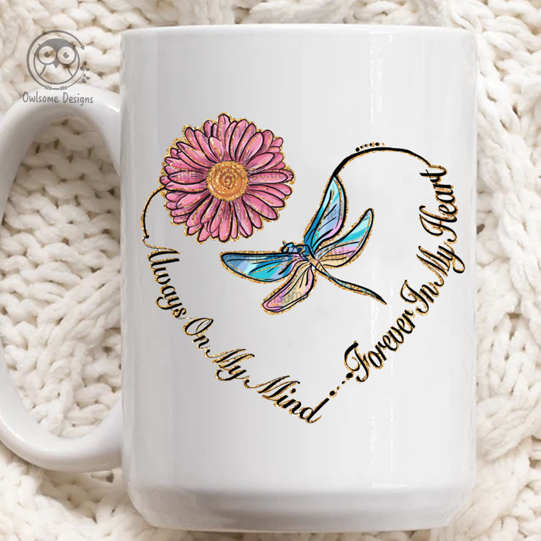 Image of a cup with beautiful dragonfly print and heart shaped flower.
