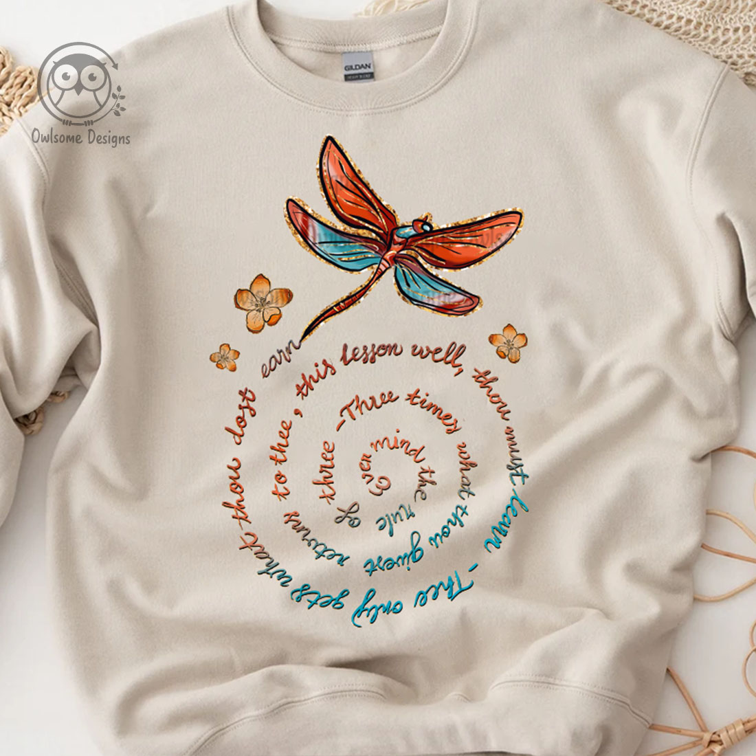 Image of sweatshirt with irresistible dragonfly print.