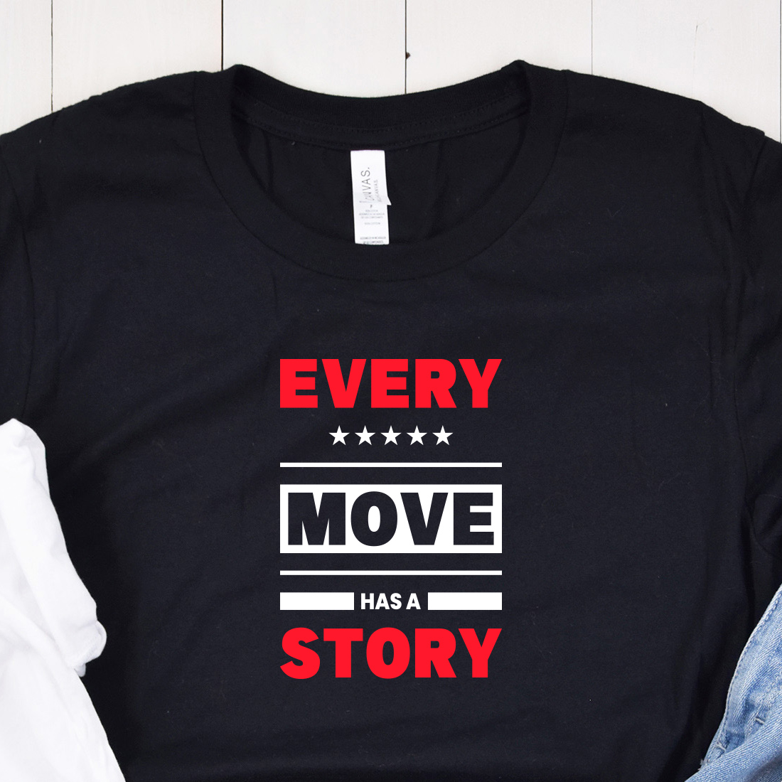 Image of a black t-shirt with a gorgeous "every move has a story" slogan in red and white colors.