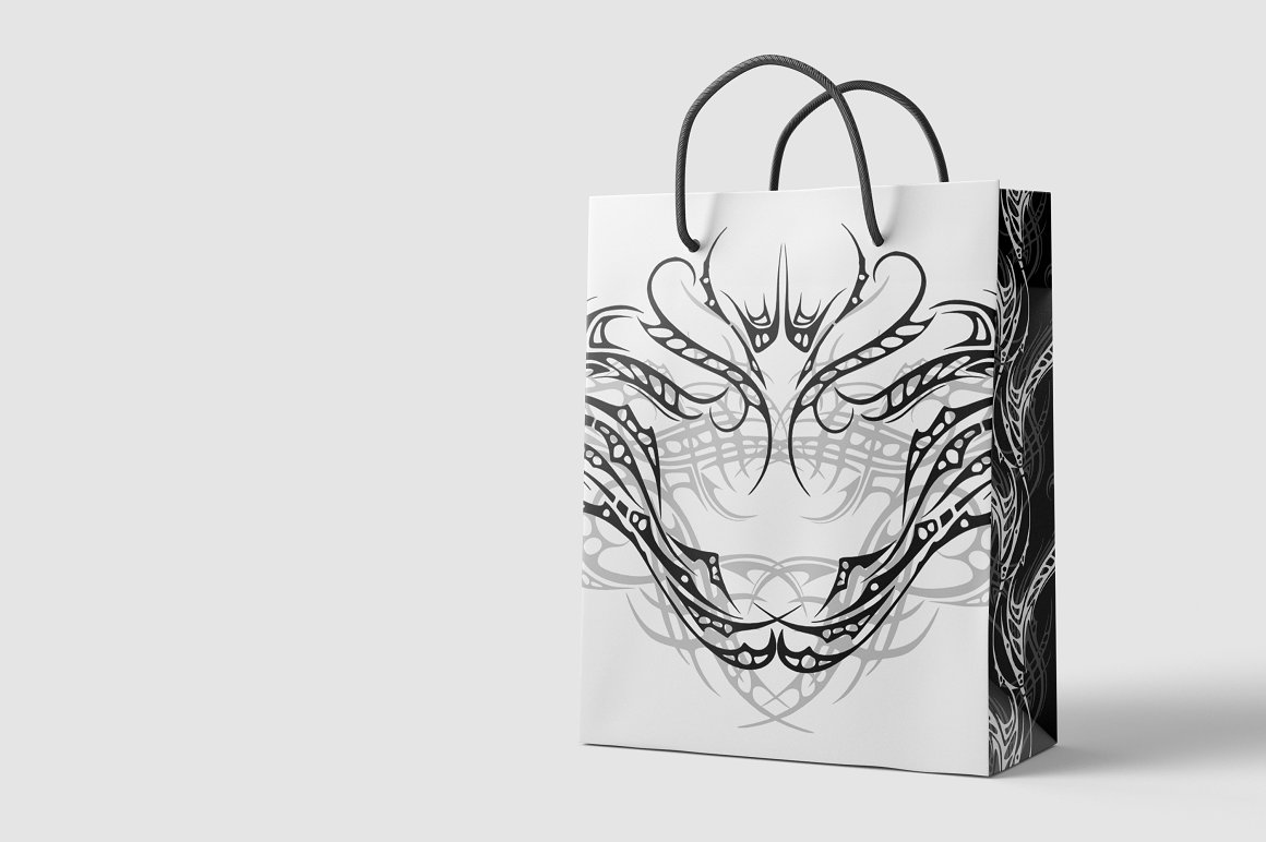 White-black package with black tattoo design on a gray background.