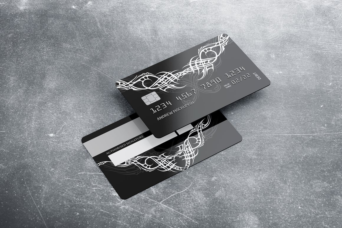 Bank card in black with white tattoo designs.