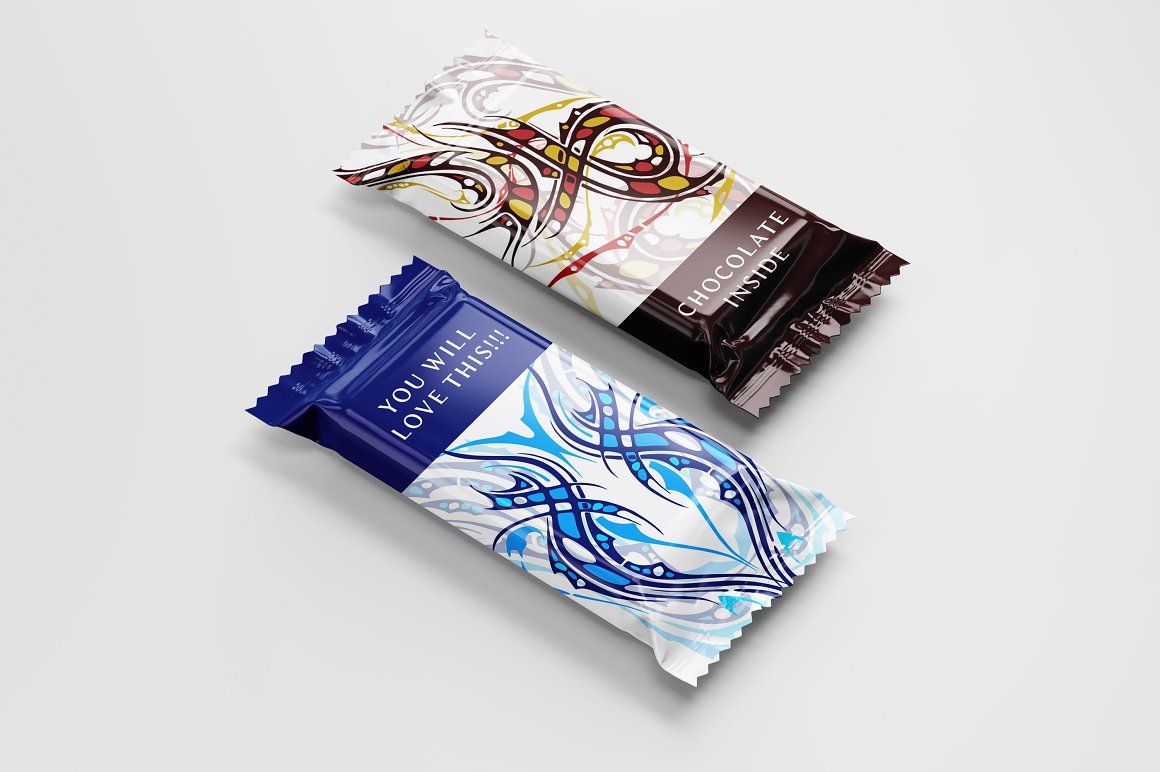 Blue and brown chocolate bars with white lettering and tattoo designs on a gray background.