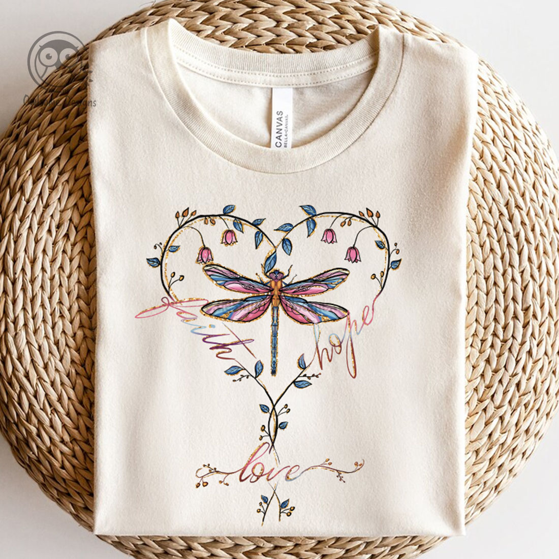 Image of a t-shirt with wonderful dragonfly print and lettering.