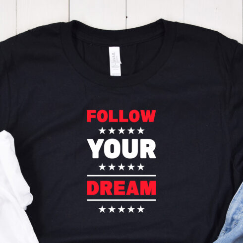 Image of a black t-shirt with the enchanting inscription "follow your dream" in red and white colors.