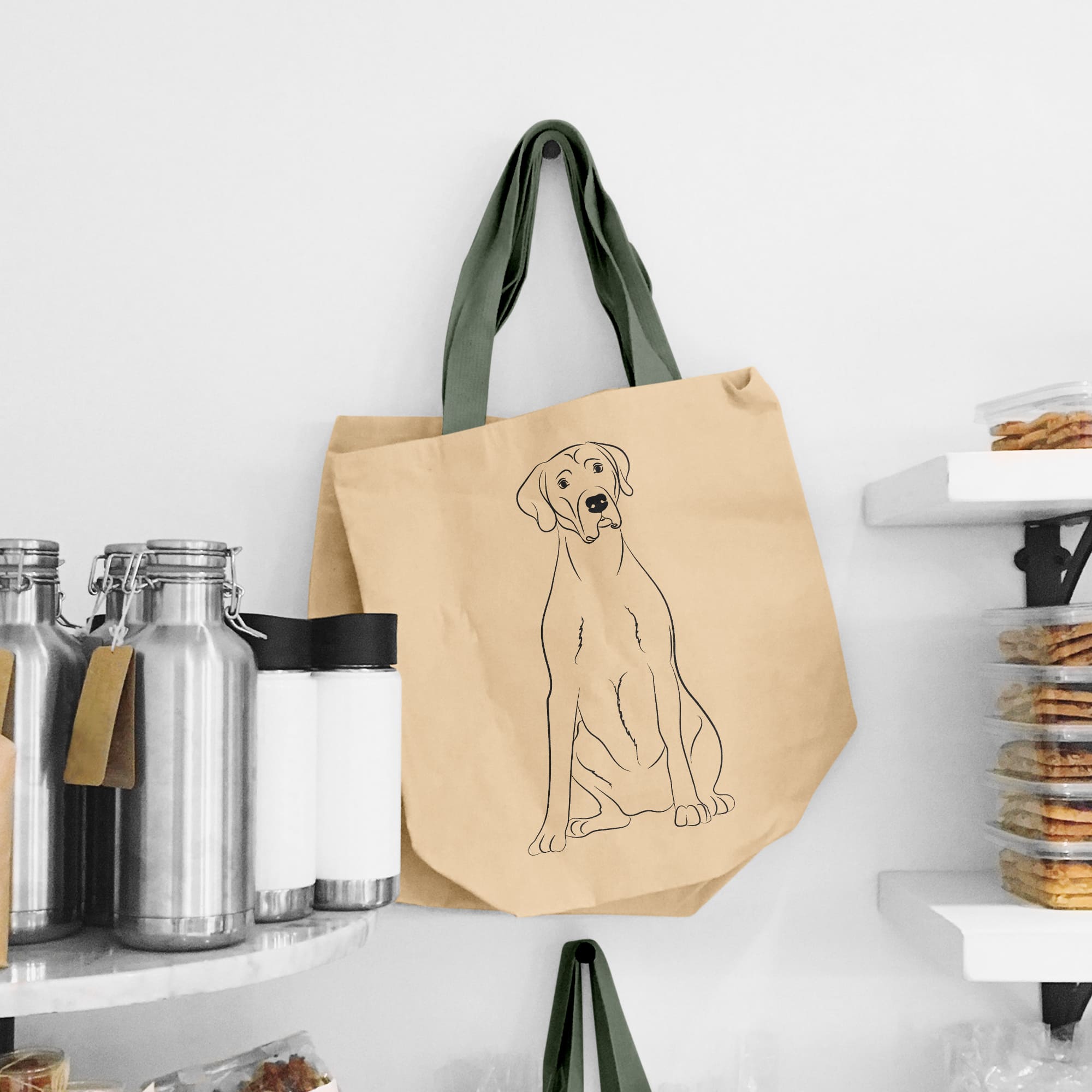 Brown paper bag with a drawing of a dog on it.
