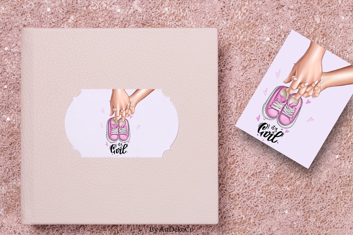Pink photo album and white card with illustration of hands parents-to-be and pink shoes.