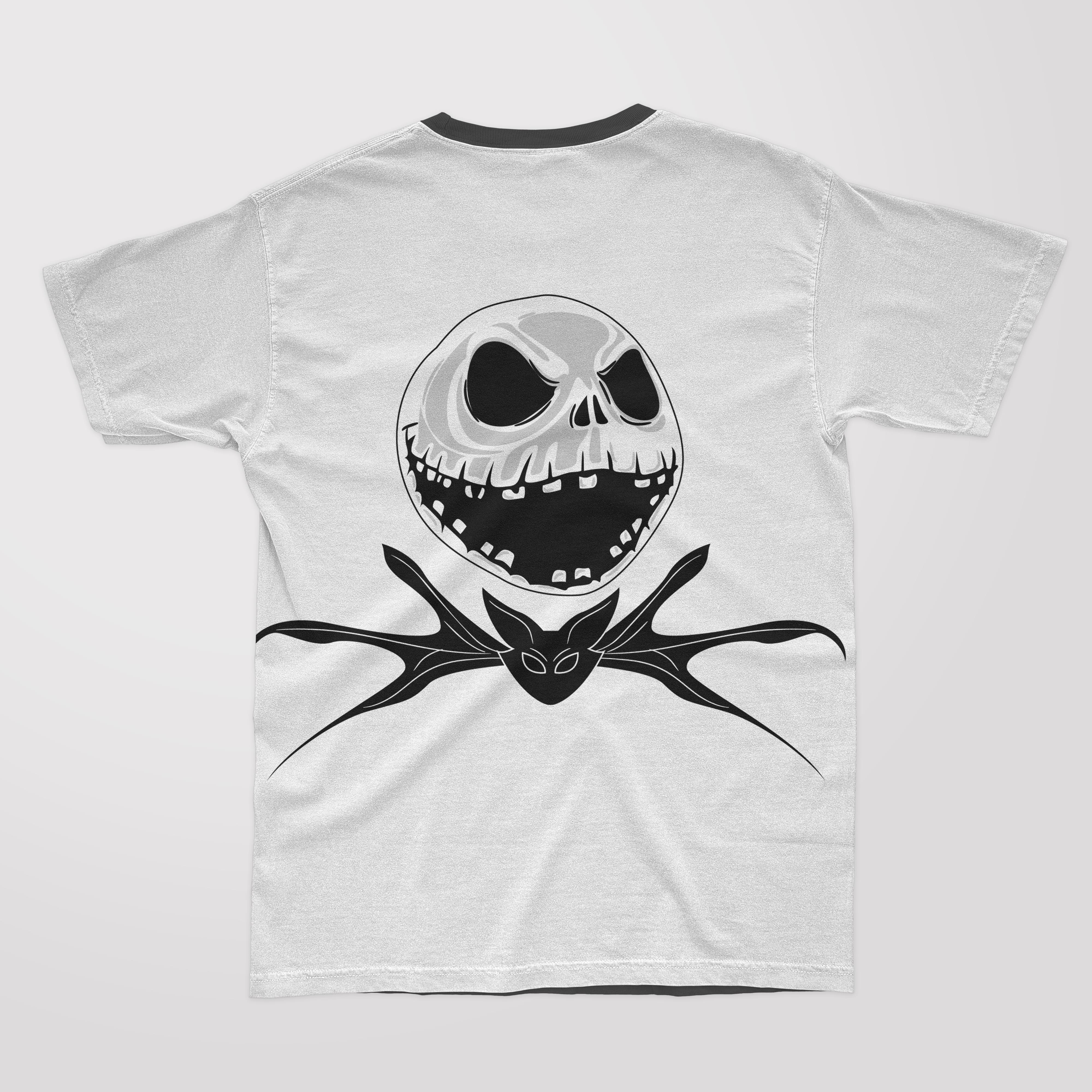 Black and white t-shirt with skellington and bat illustrations.