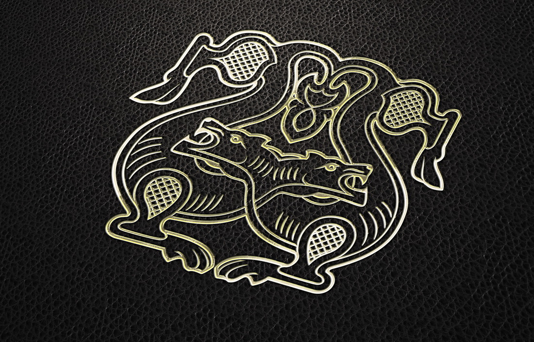 Black book with a gold design on it.