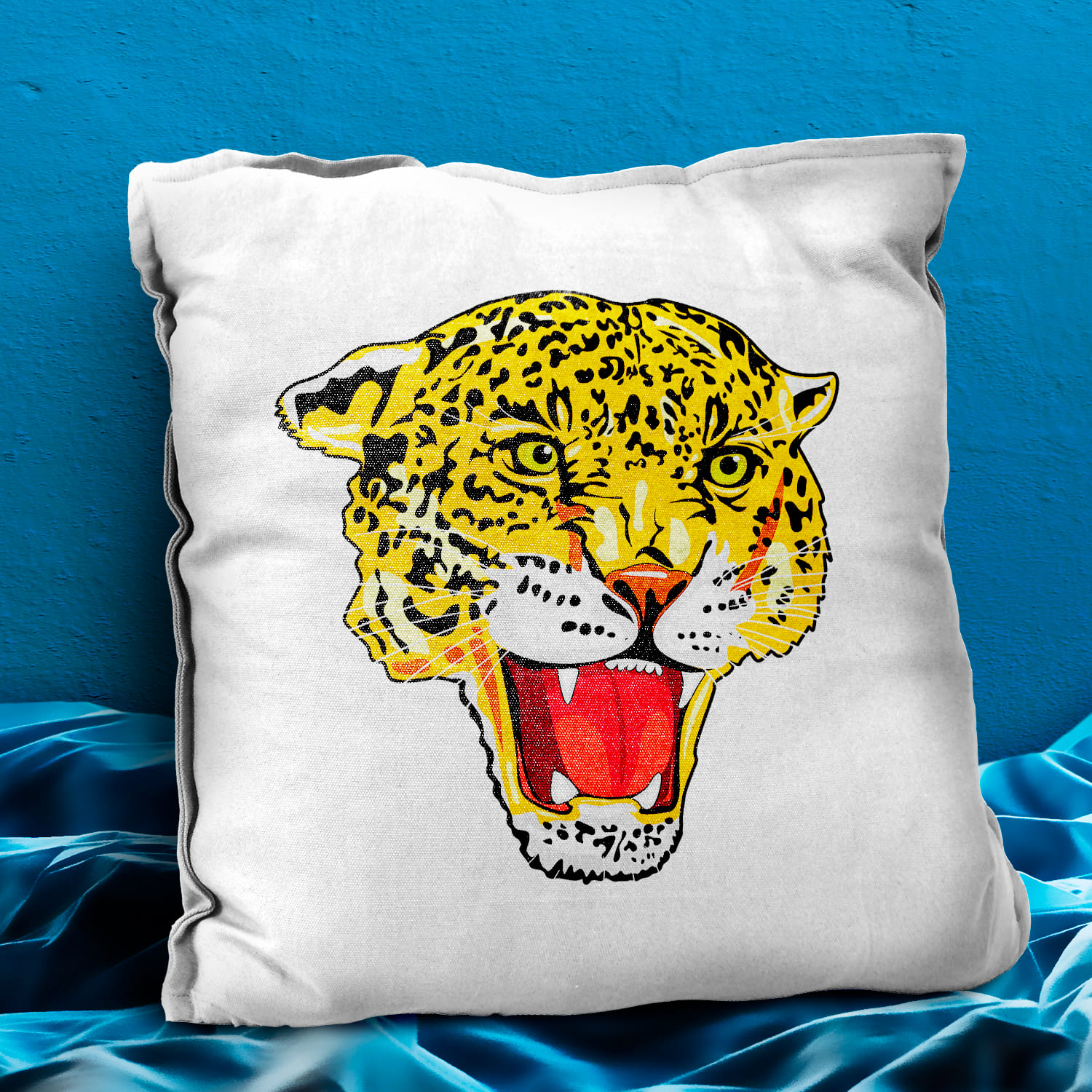 Pillow with a picture of a leopard on it.