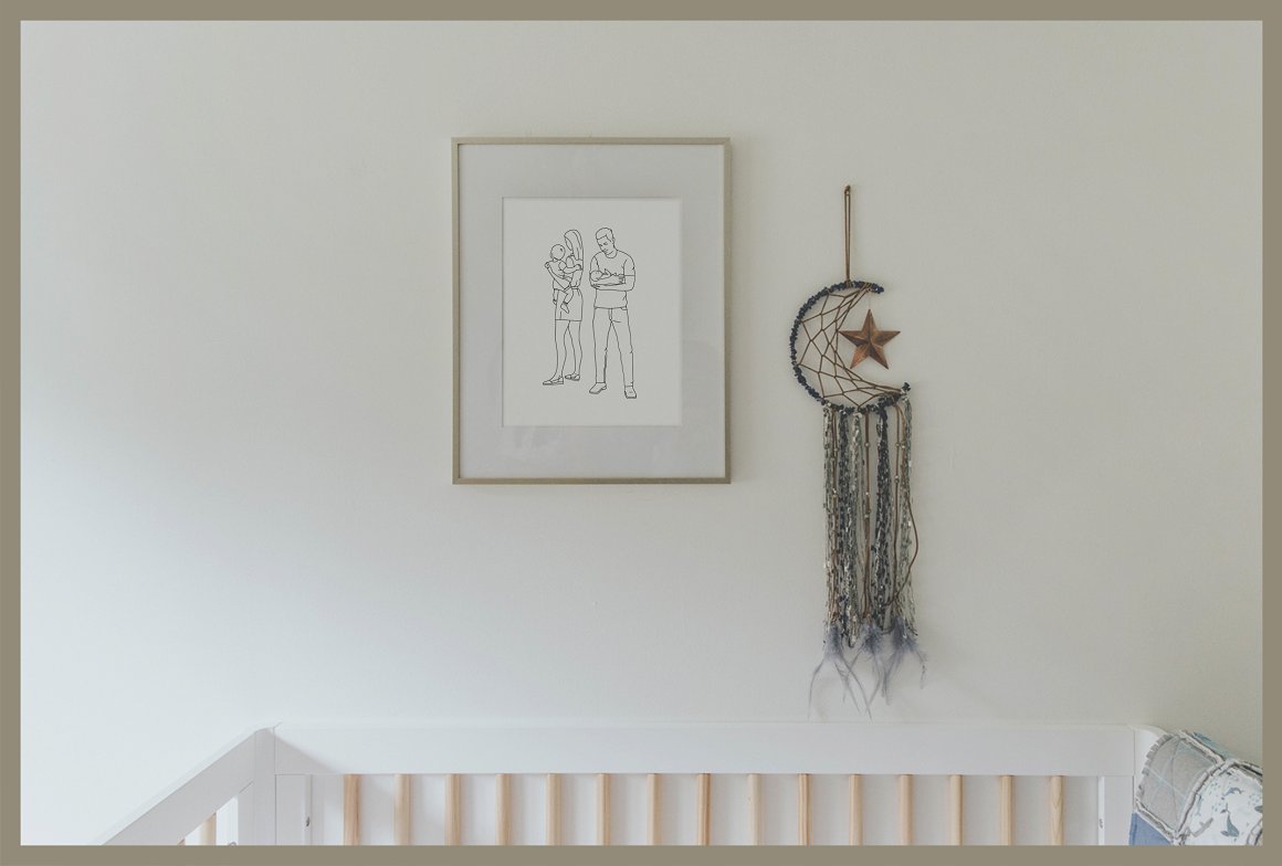 Painting with family illustration in golden frame and dream Catcher on the wall.