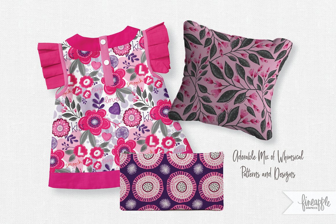 A set of pink baby dress, pink and green pillow and purple textile with lovelies pattern on a gray background.